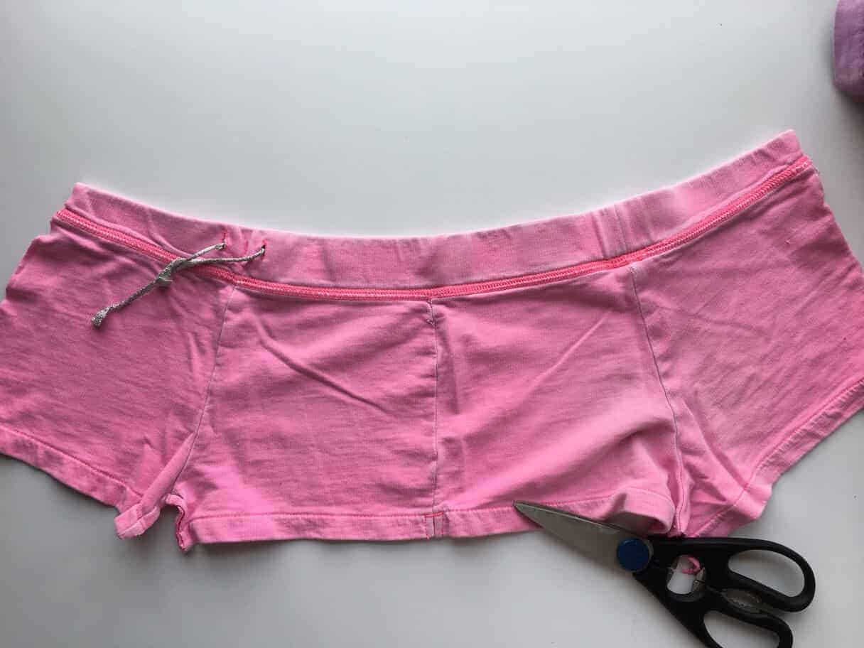 pair of pink shorts cut in half on seam