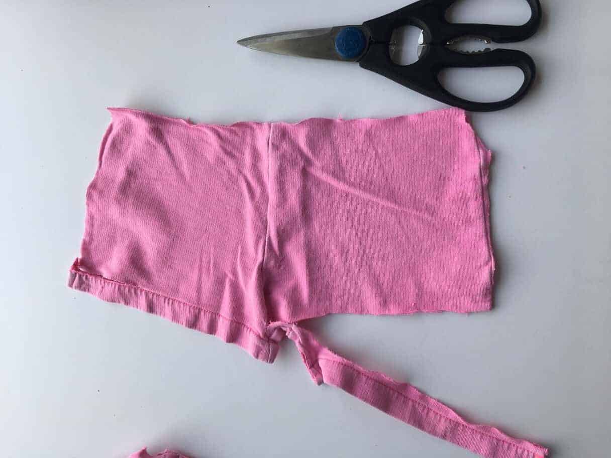 pink shorts cut in half with the leg seam cut out