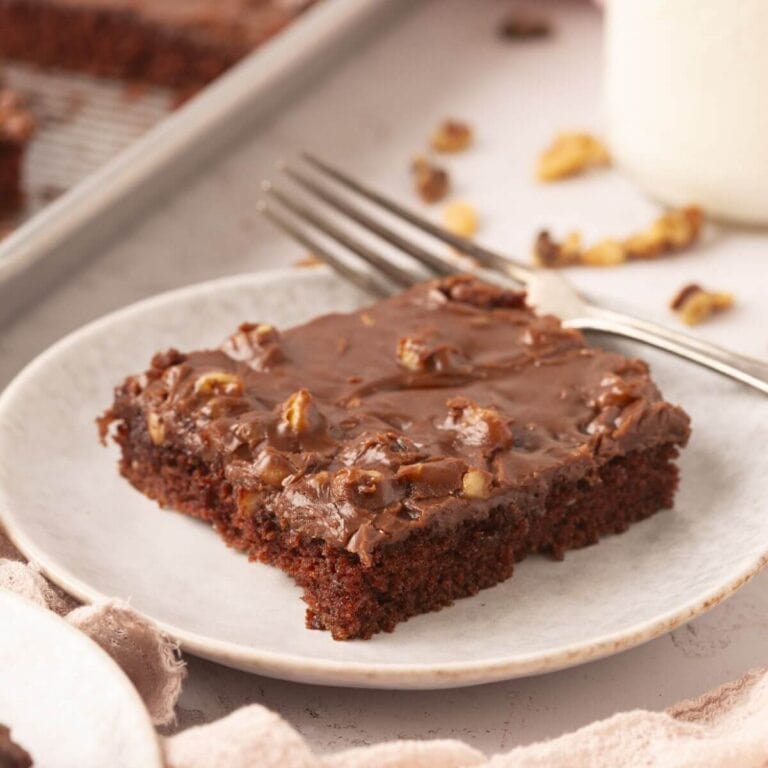 Texas chocolate sheet cake cut on a plate