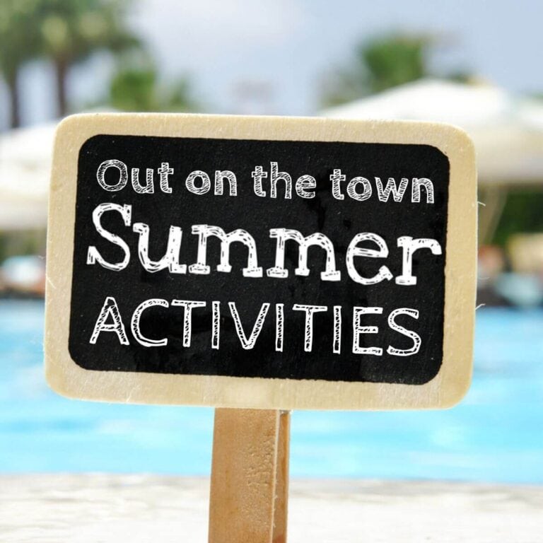 chalkboard that says out on the town summer activities