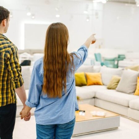 couple shopping for furniture at a discount store