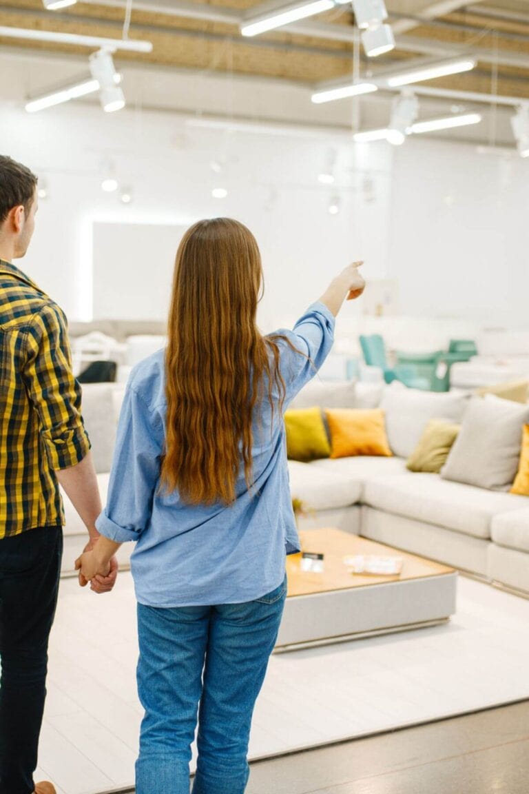 couple shopping for furniture at a discount store