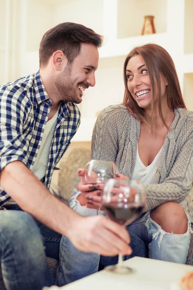couple drinking wine for date night at home