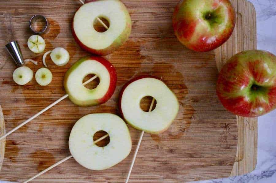 apple slices on wooden skewers