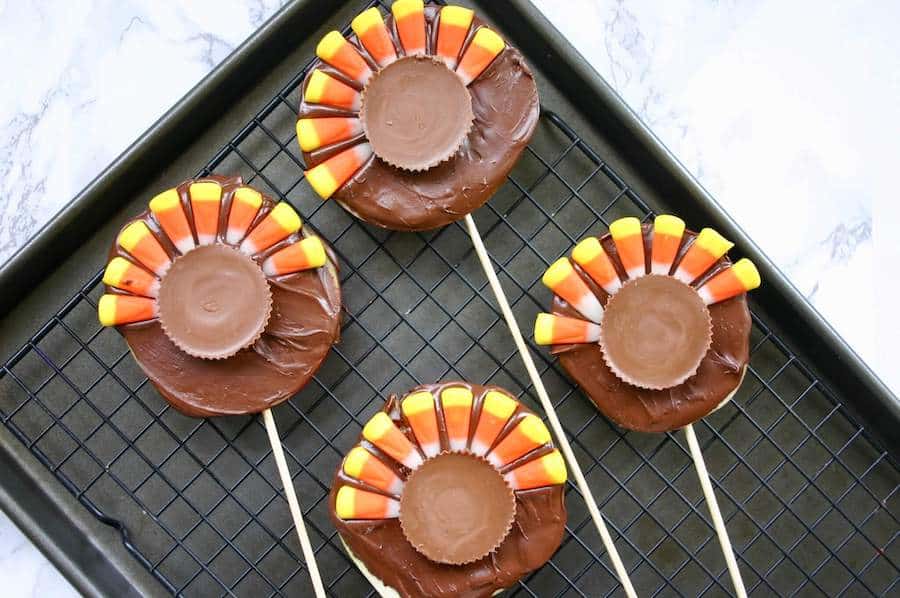 chocolate apple Thanksgiving snacks for kids being made