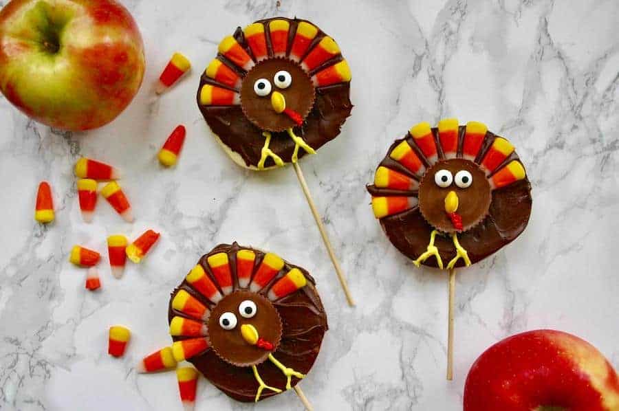 chocolate dipped apple slices decorated to look like turkeys