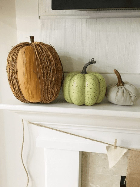 This easy DIY fall fireplace decor is the perfect way to decorate your house for fall if you like minimalistic style and you're on a budget!