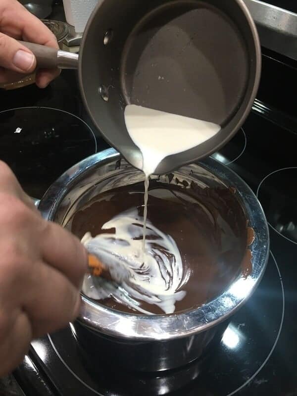 Mix heavy cream with melted chocolate to make chocolate fondue