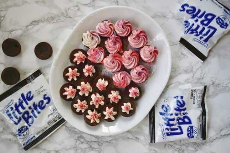 Try these easy no bake Valentines brownies for your kids Valentines Day party! These Valentines treats are super easy to make with store bought brownie bites and frosting! A great yummy and easy dessert for Valentines Day!