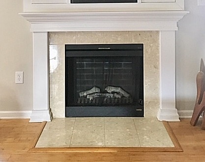 Want to know how to paint fireplace tile to look like subway tile? Try this tutorial to paint tile on your fireplace and transform it from boring builder grade tile to faux subway tile without a stencil!