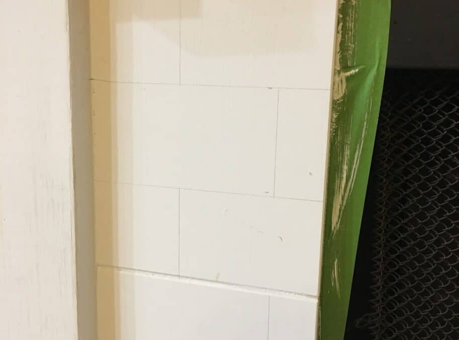 Want to know how to paint fireplace tile to look like subway tile? Try this tutorial to paint tile on your fireplace and transform it from boring builder grade tile to faux subway tile without a stencil!