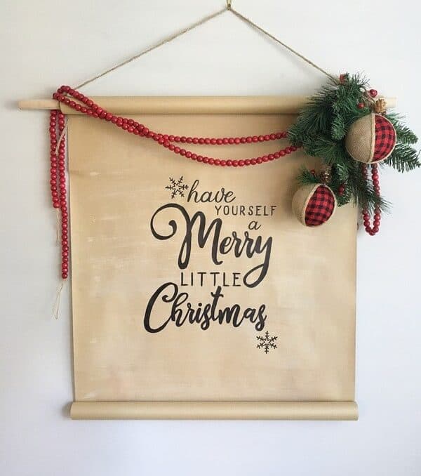 DIY scroll sign that says Merry Christmas