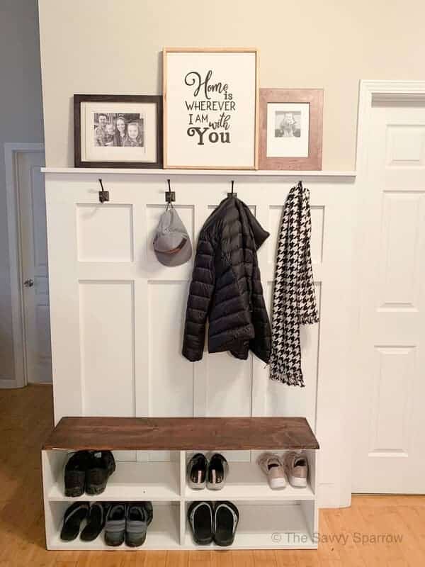 DIY mudroom wall with hooks for storage