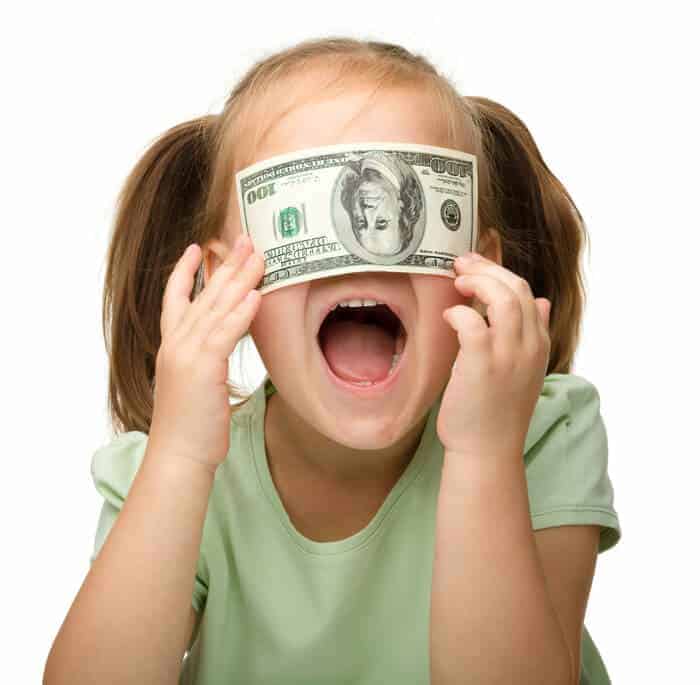 little girl with 100 dollar bill