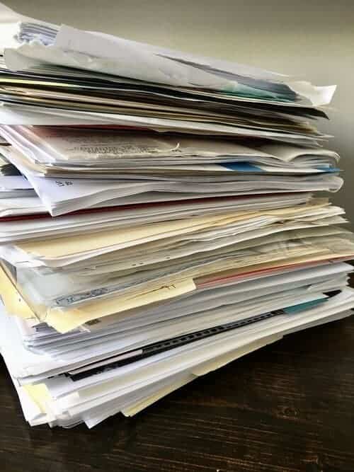 Organize paperwork by gathering all important papers.