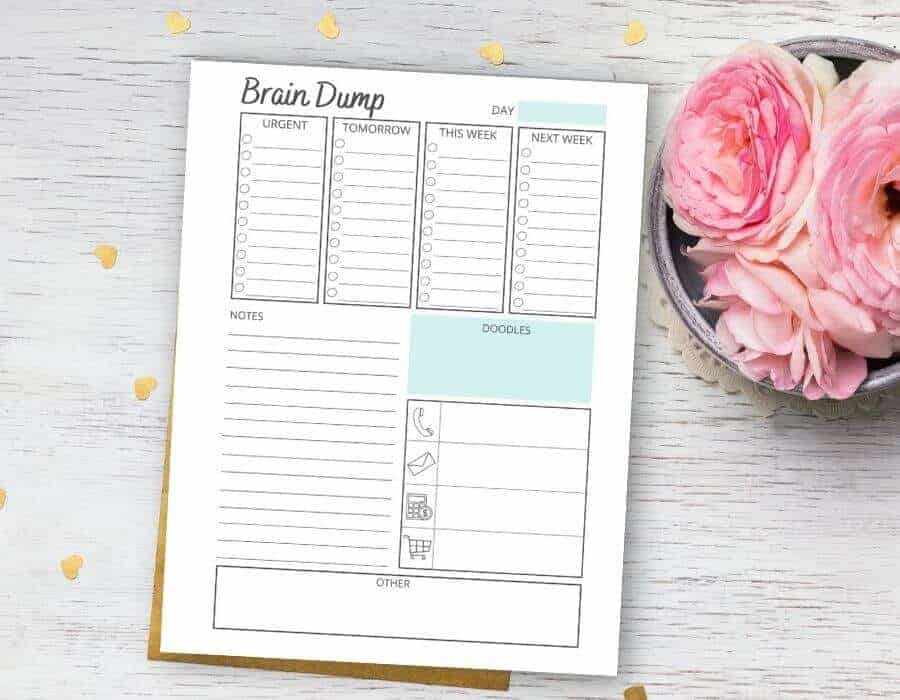 printable brain dump template on a table with pink flowers