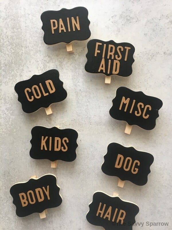DIY basket labels that say cold, first aid, kids, dog, misc