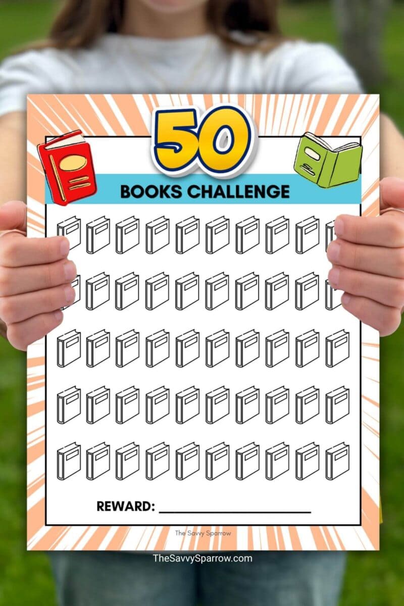 child holding a reading challenge printable for a 50 books challenge