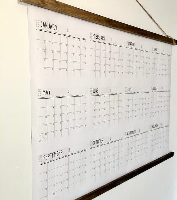 large wall calendar with all 12 months hanging on the wall