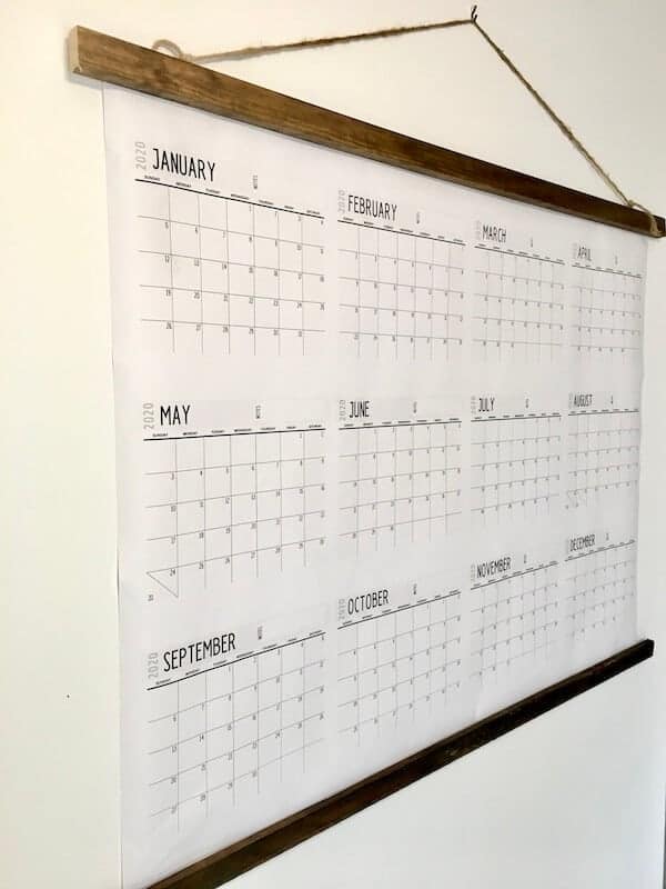 large wall calendar with all 12 months hanging on the wall