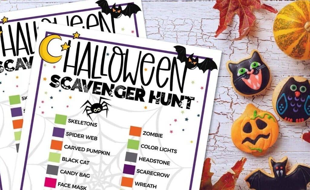 halloween painted rocks on table with halloween scavenger hunt printable