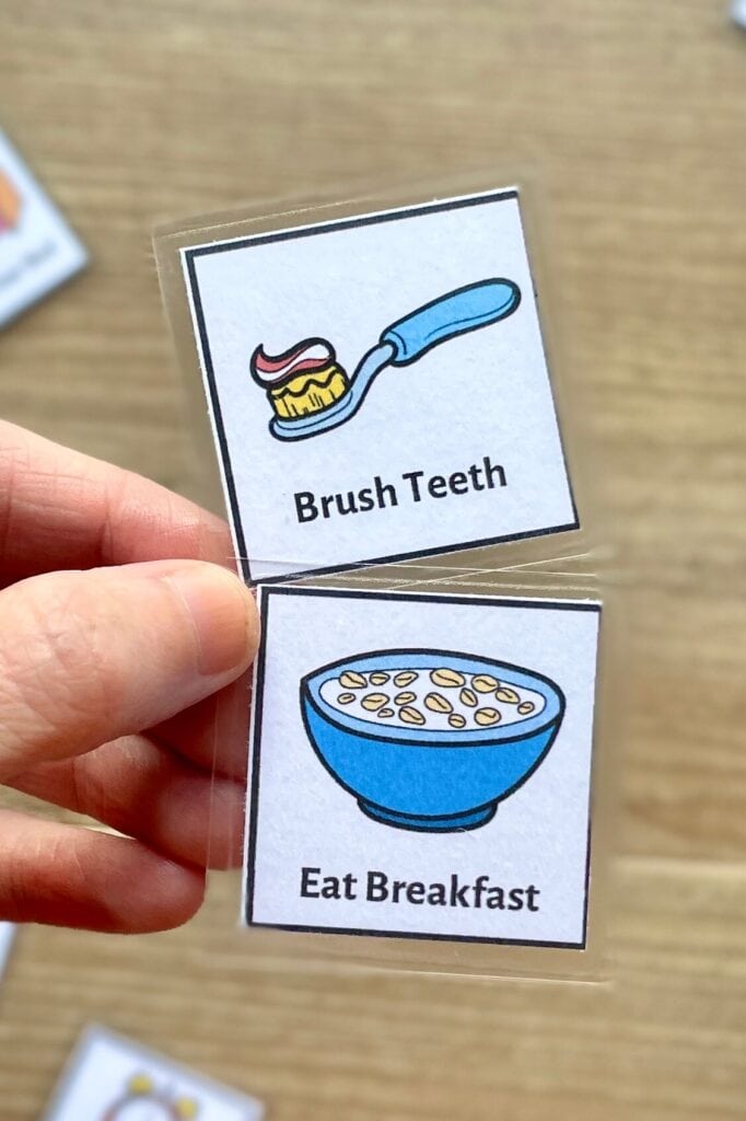 two picture routine cards that say brush teeth and eat breakfast