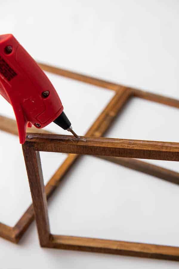 gluing stretch canvas frames together to form a DIY window frame