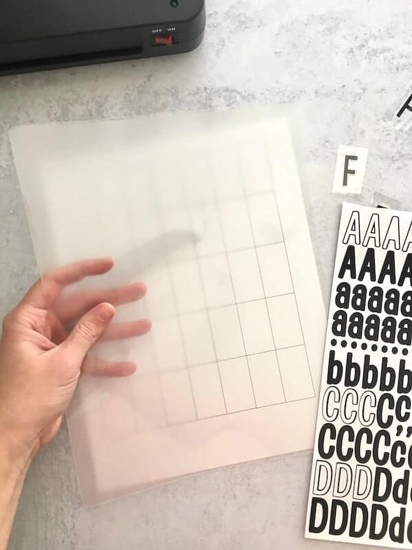 printable template for DIY letter board letters underneath a laminating pouch