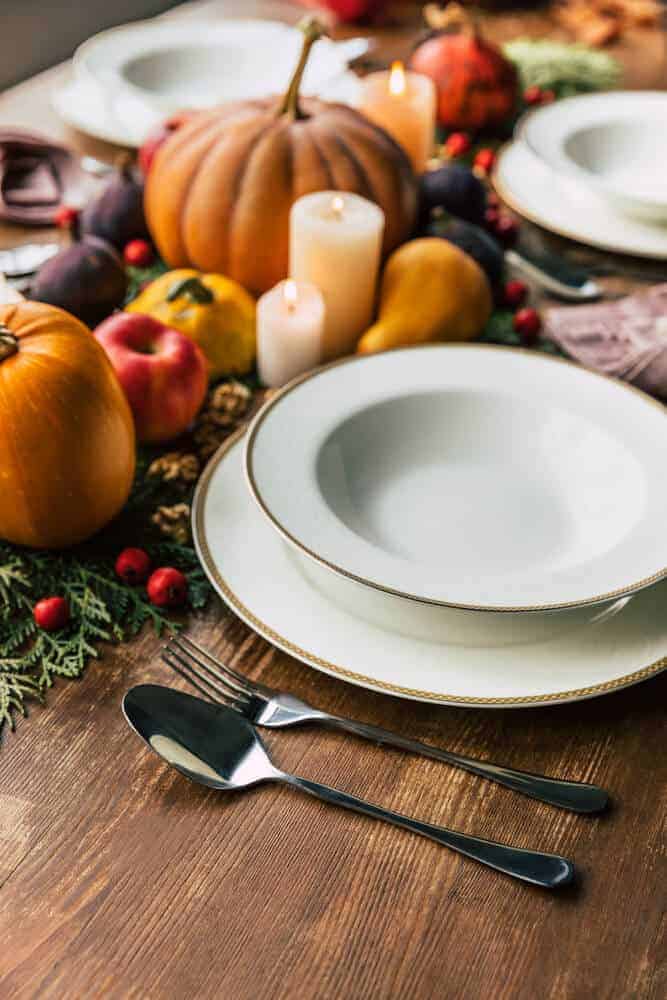 dining table decorated for Thanksgiving dinner