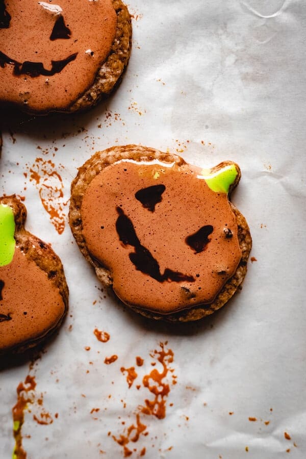 pumpkin shaped decorated Halloween cookies