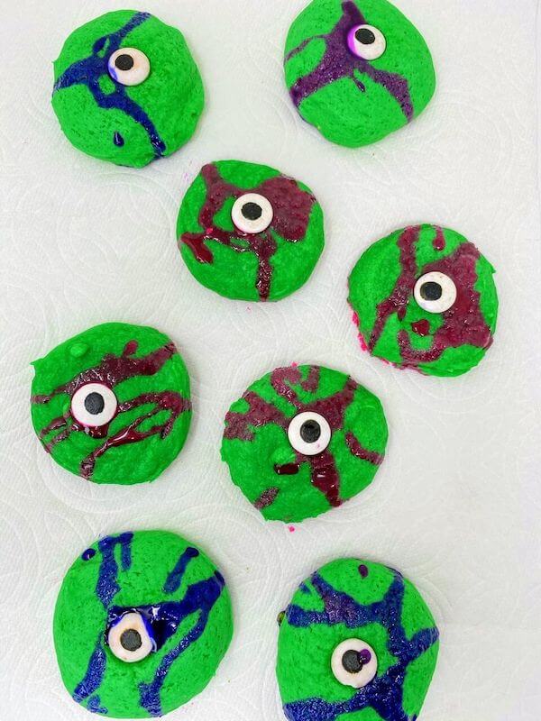 green cookies with food coloring and candy eyeballs