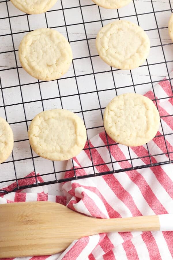 sugar cookies cooling on a wire rack