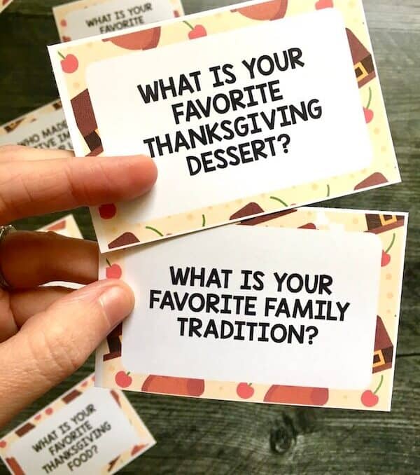 conversation cards that say What is your favorite family tradition and what is your favorite Thanksgiving dessert