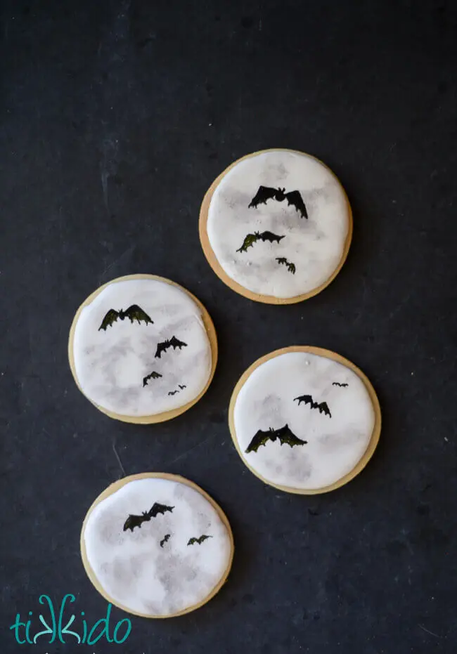 sugar cookies decorated to look like full moons