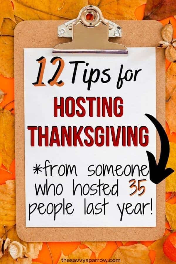 paper on a clipboard that says 12 tips for hosting thanksgiving