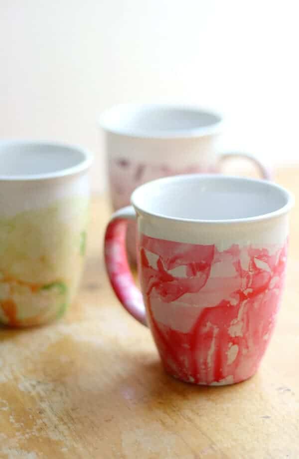 painted coffee mugs to give as DIY Christmas gifts