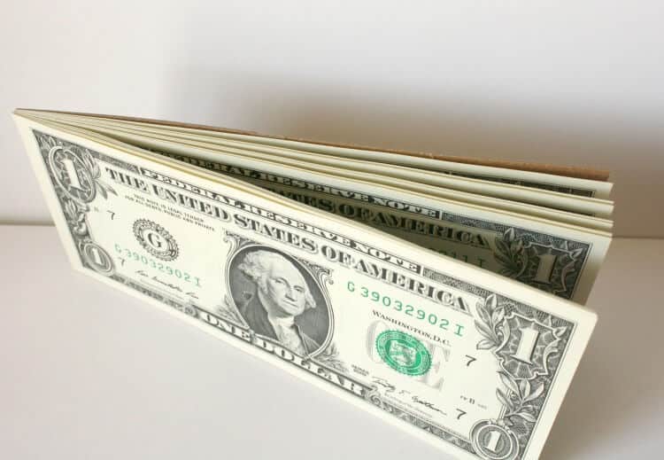 dollar bills in a notepad for DIY money gifts