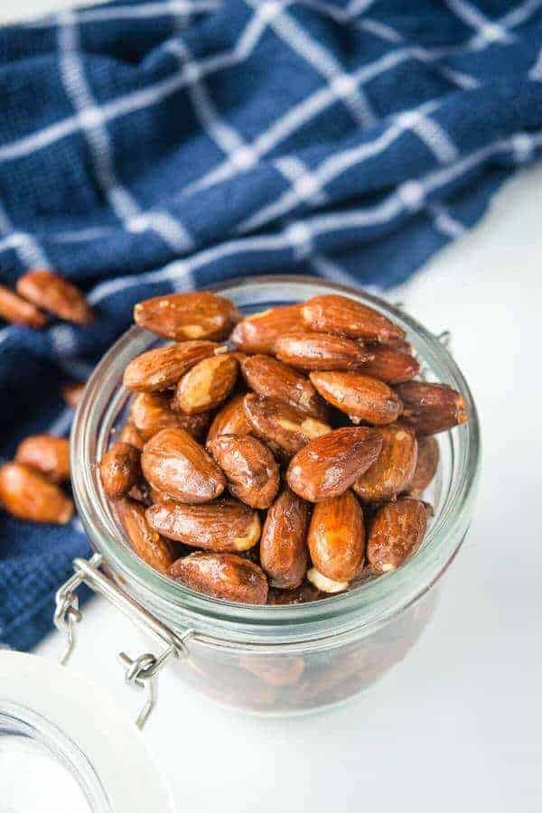 homemade candied almonds in a gift jar