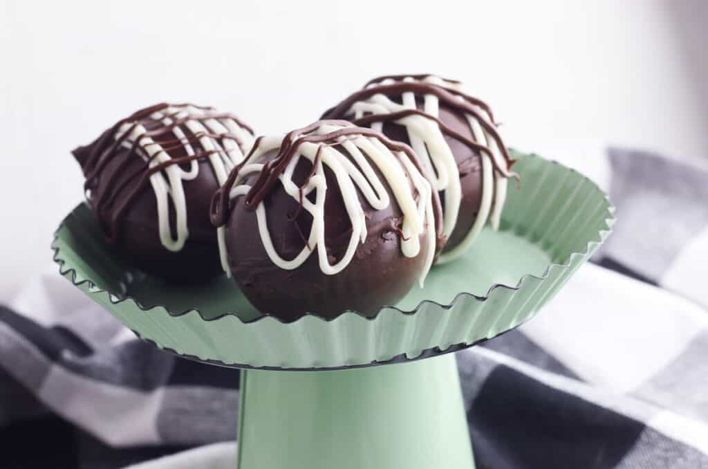 hot chocolate bombs on a serving tray