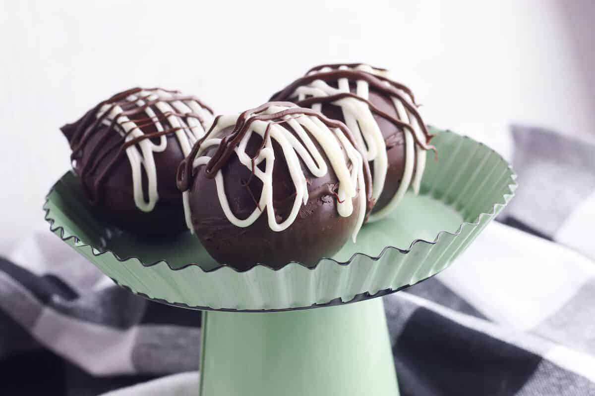 hot chocolate bombs on a serving tray