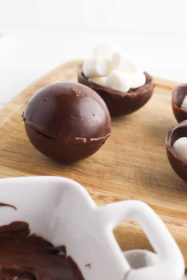 hot chocolate bombs on a cutting board
