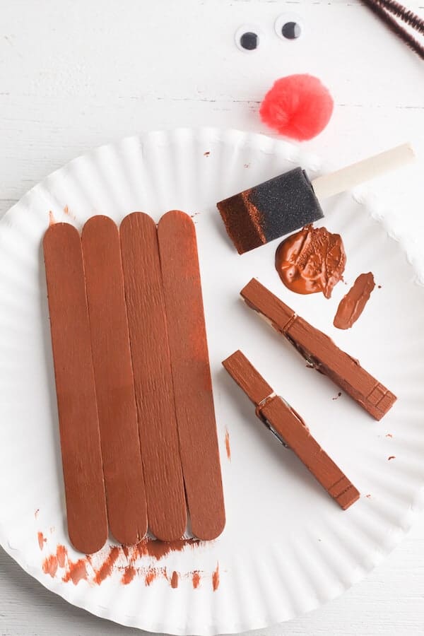 popsicle sticks and clothespins painted brown