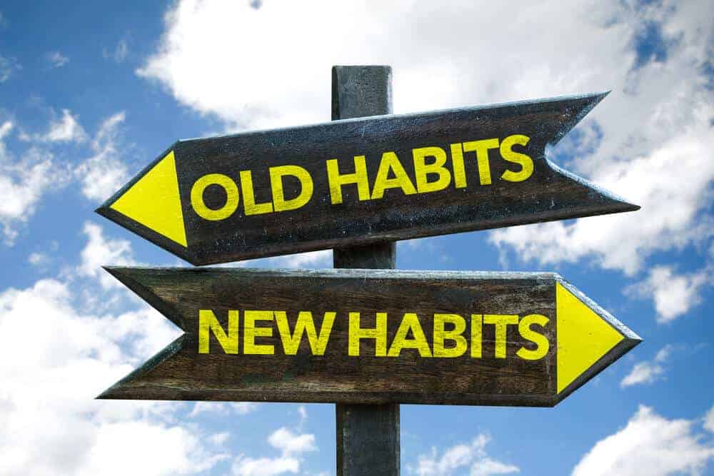 sign that says old habits and new habits