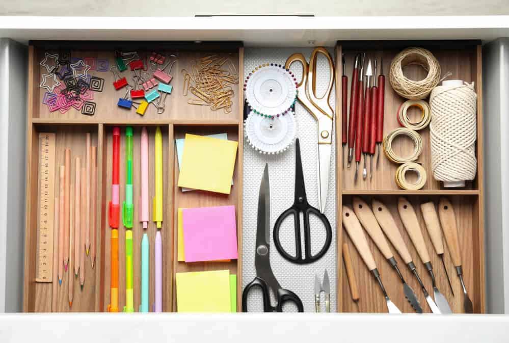 office supplies in drawer organizers