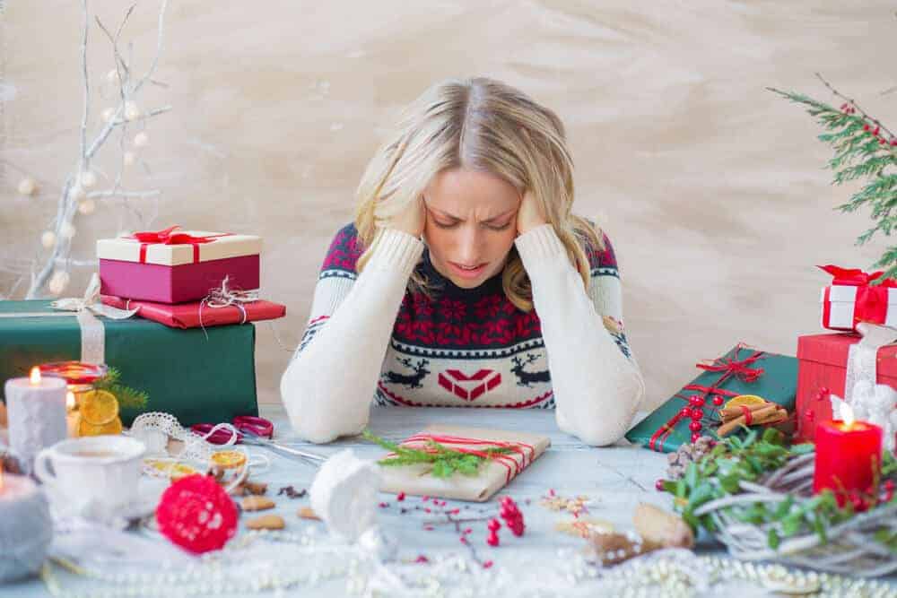 woman stressed out about Christmas gifts