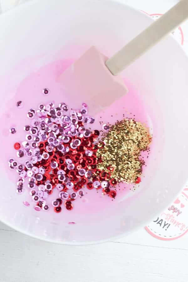 valentines day slime in a bowl with glitter