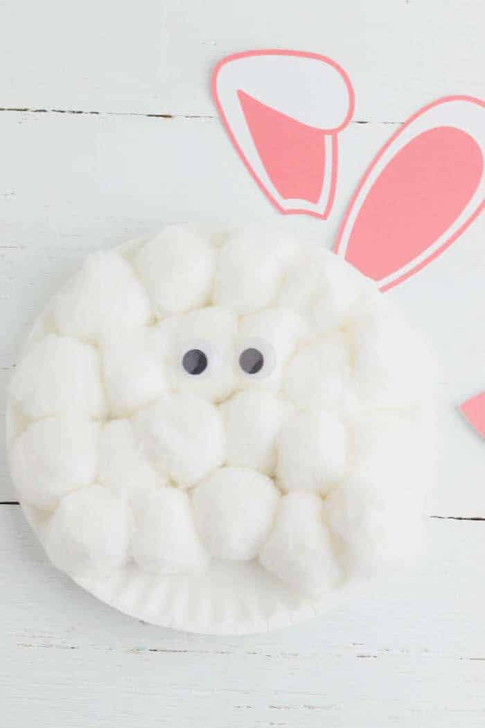cotton balls glued on a paper plate