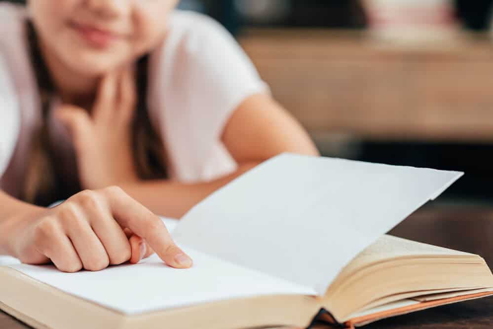 girl reading a book