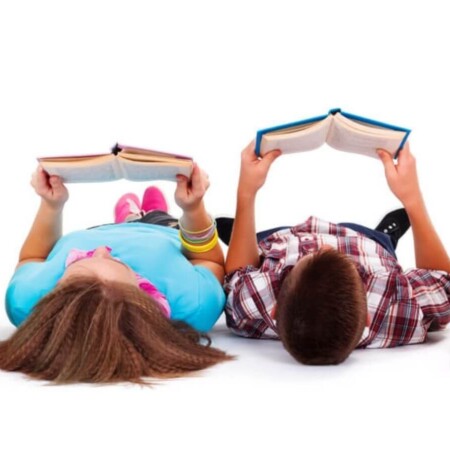 two kids reading books