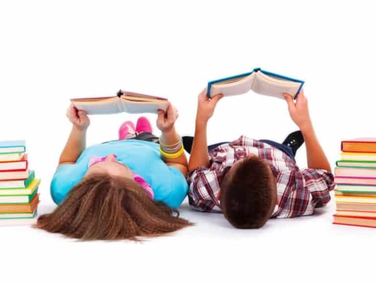 two kids reading books